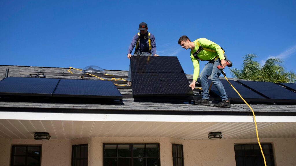 Image of a solar company representative discussing options with a homeowner